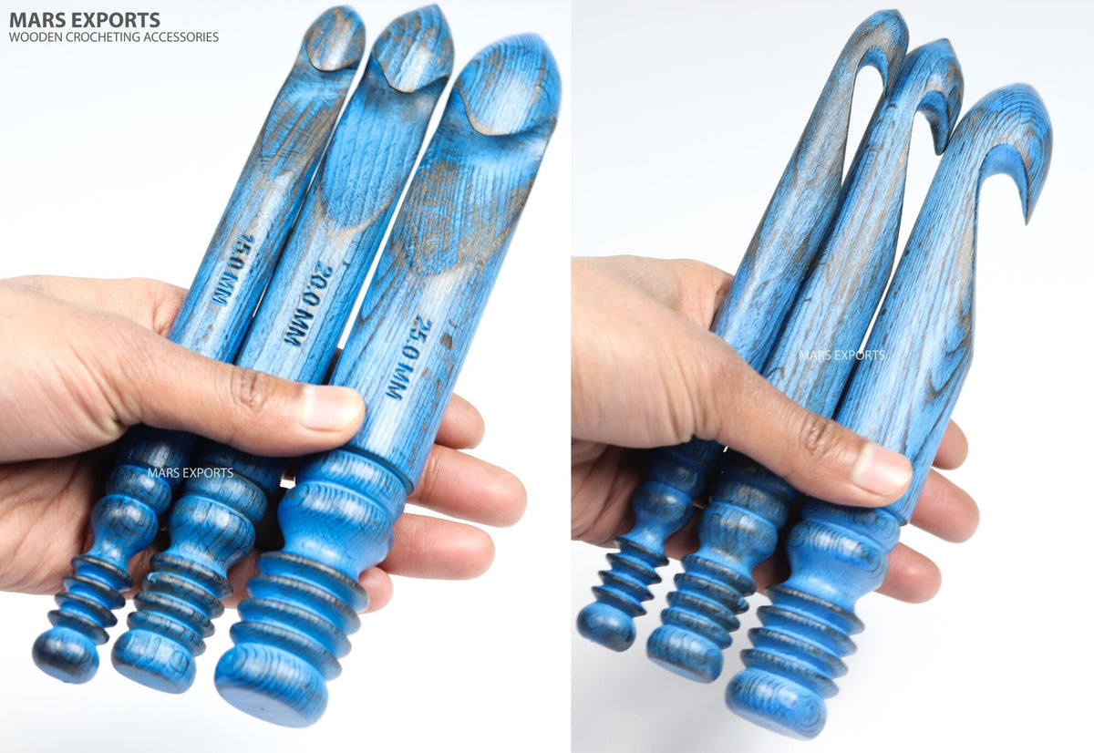 15 mm, 20 mm and 25 mm antique blue crochet hooks shown at hand scale