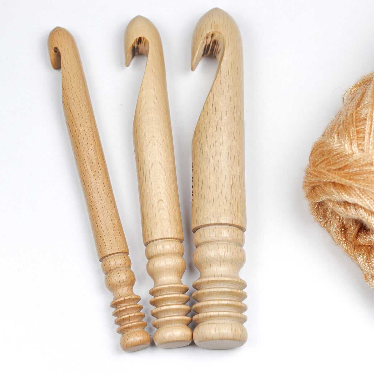 Smooth beechwood crochet hook detail with natural wooden grain