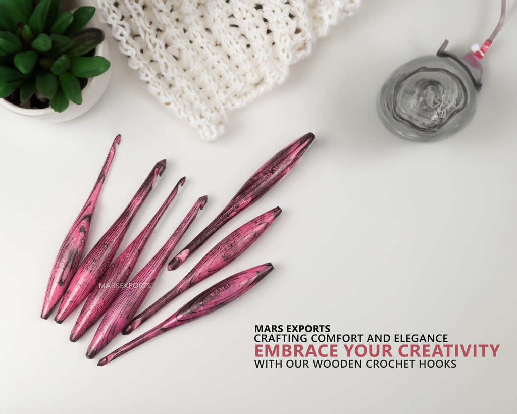 Antique red wooden dolphin crochet hooks in a yarn-crafting lifestyle scene