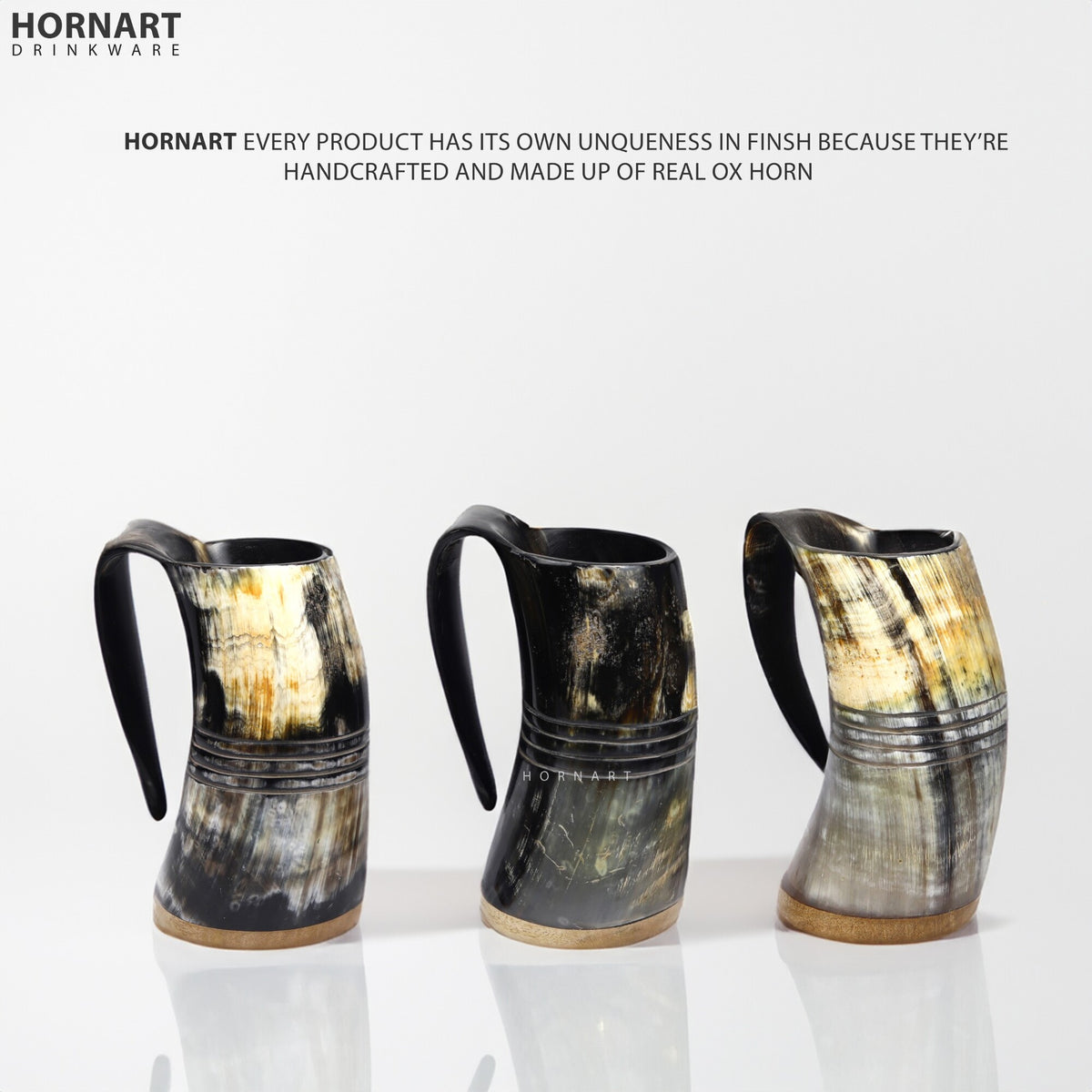 Handcrafted natural ox horn mugs showing unique artisan finishes