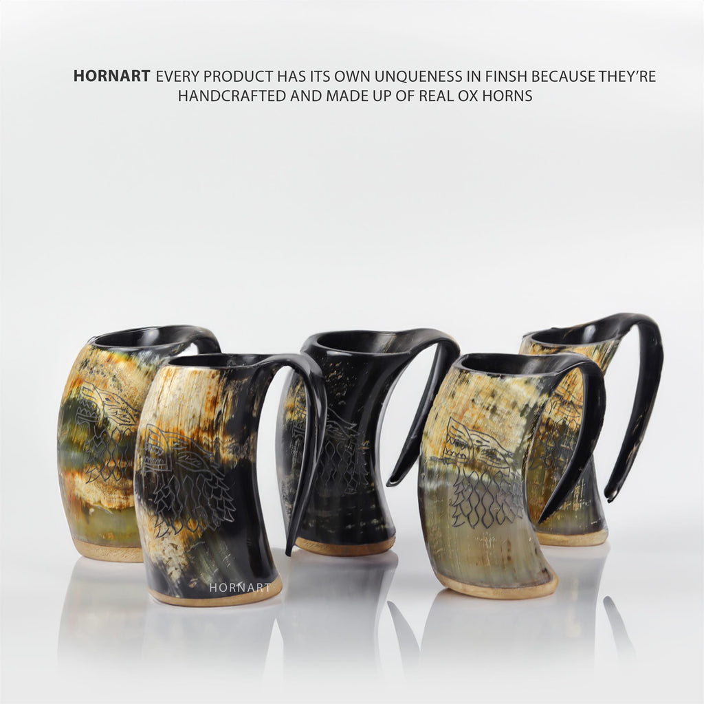 Handcrafted natural ox horn Viking mugs showing unique colour and grain variations