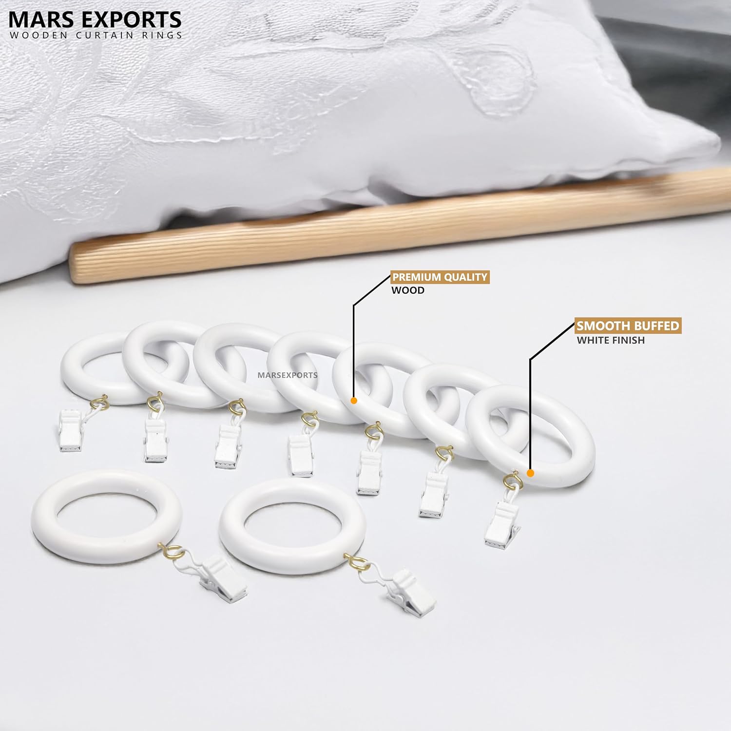 White wooden curtain rings with clips