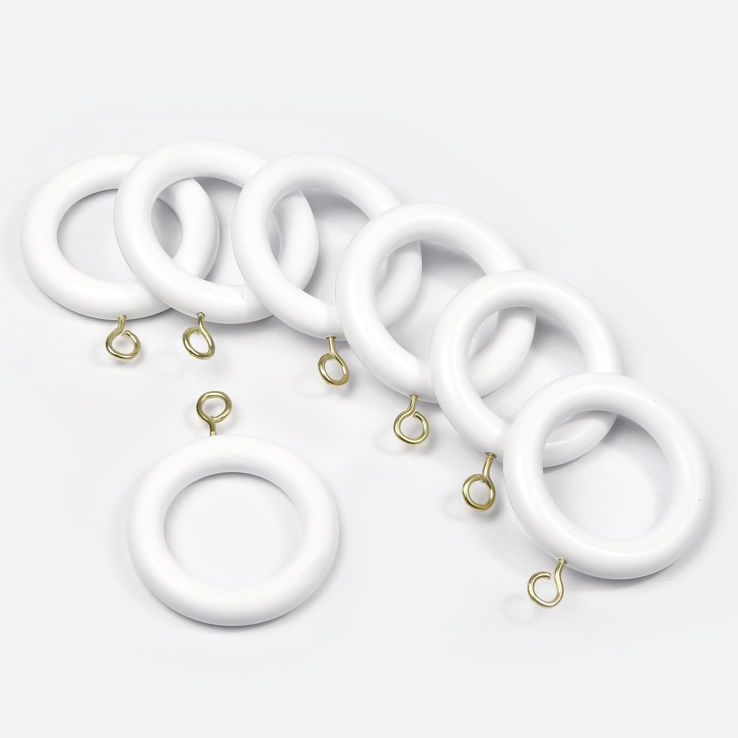 White wooden curtain rings without hooks